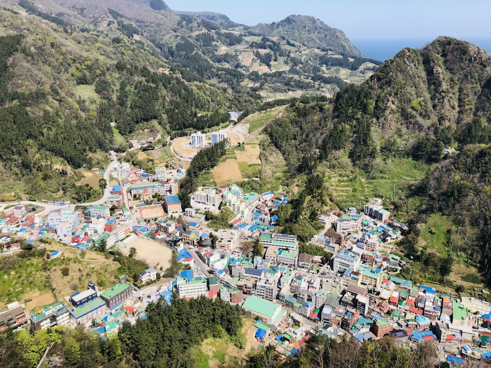 multicolored buildings in valley below