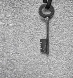 An elegant and simple icon of an old key symbolizing access to lost communication.