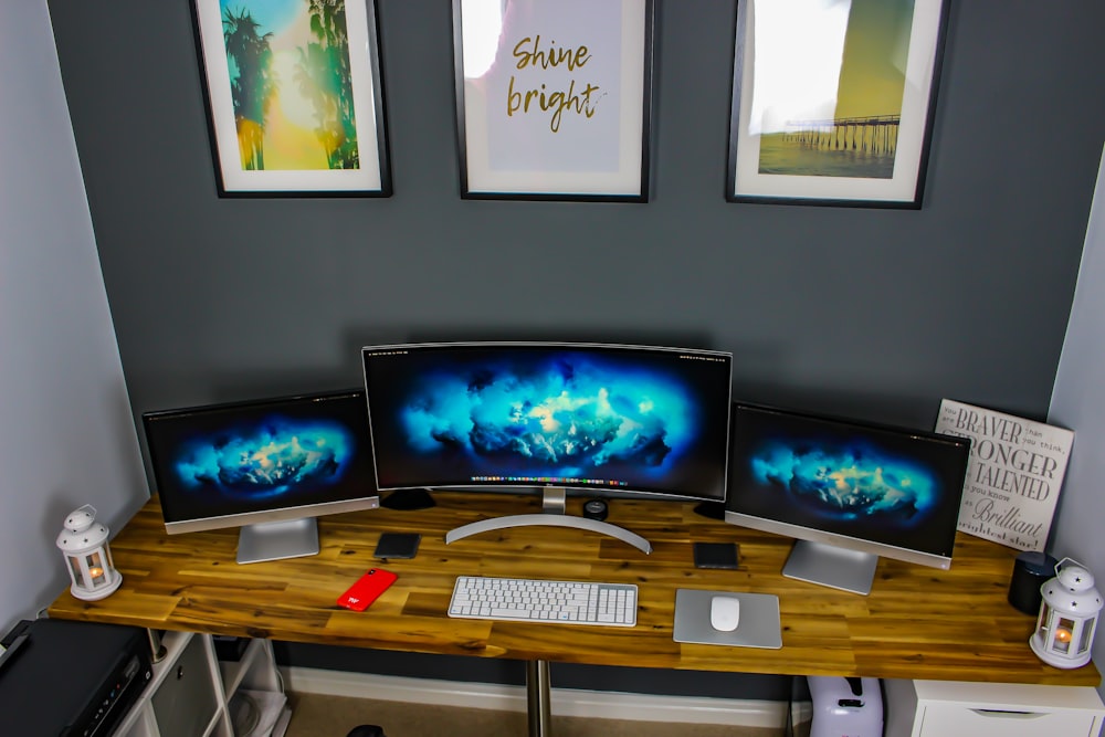 Three Flat Screen Computer Monitor On Desk Photo Free Screen