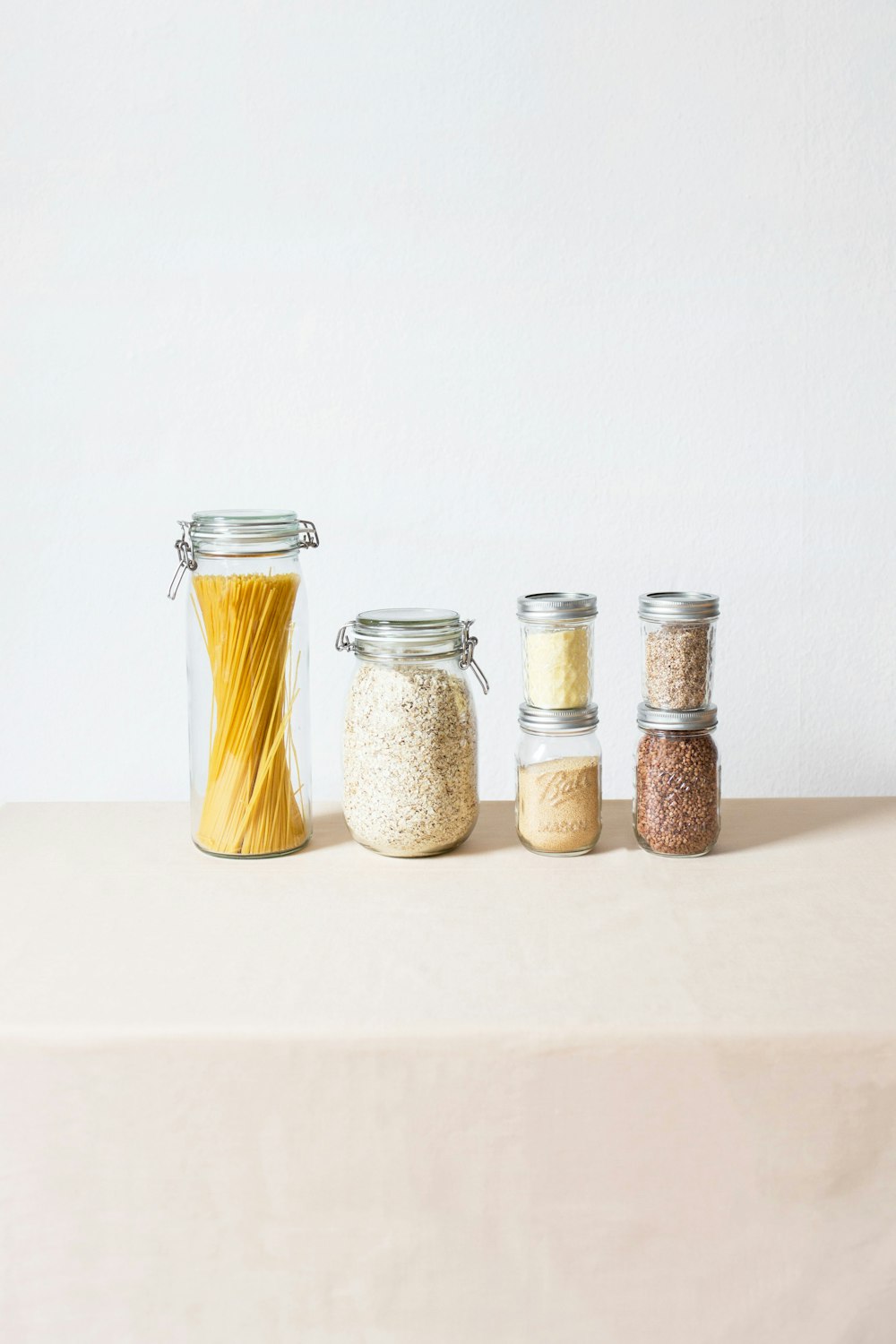 six assorted spice containers