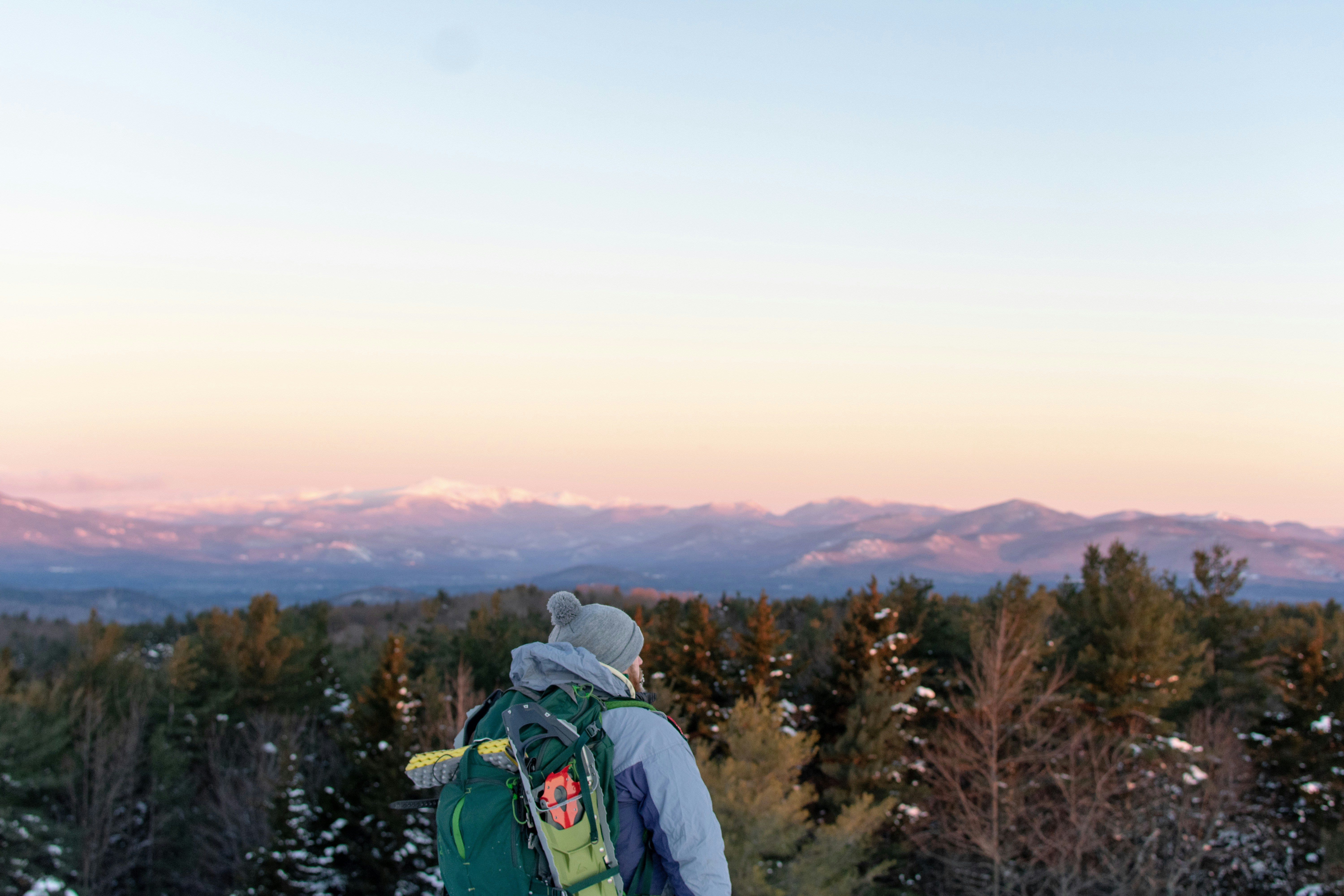 person standing in the forest during daytime, New Hampshire White Mountains.
