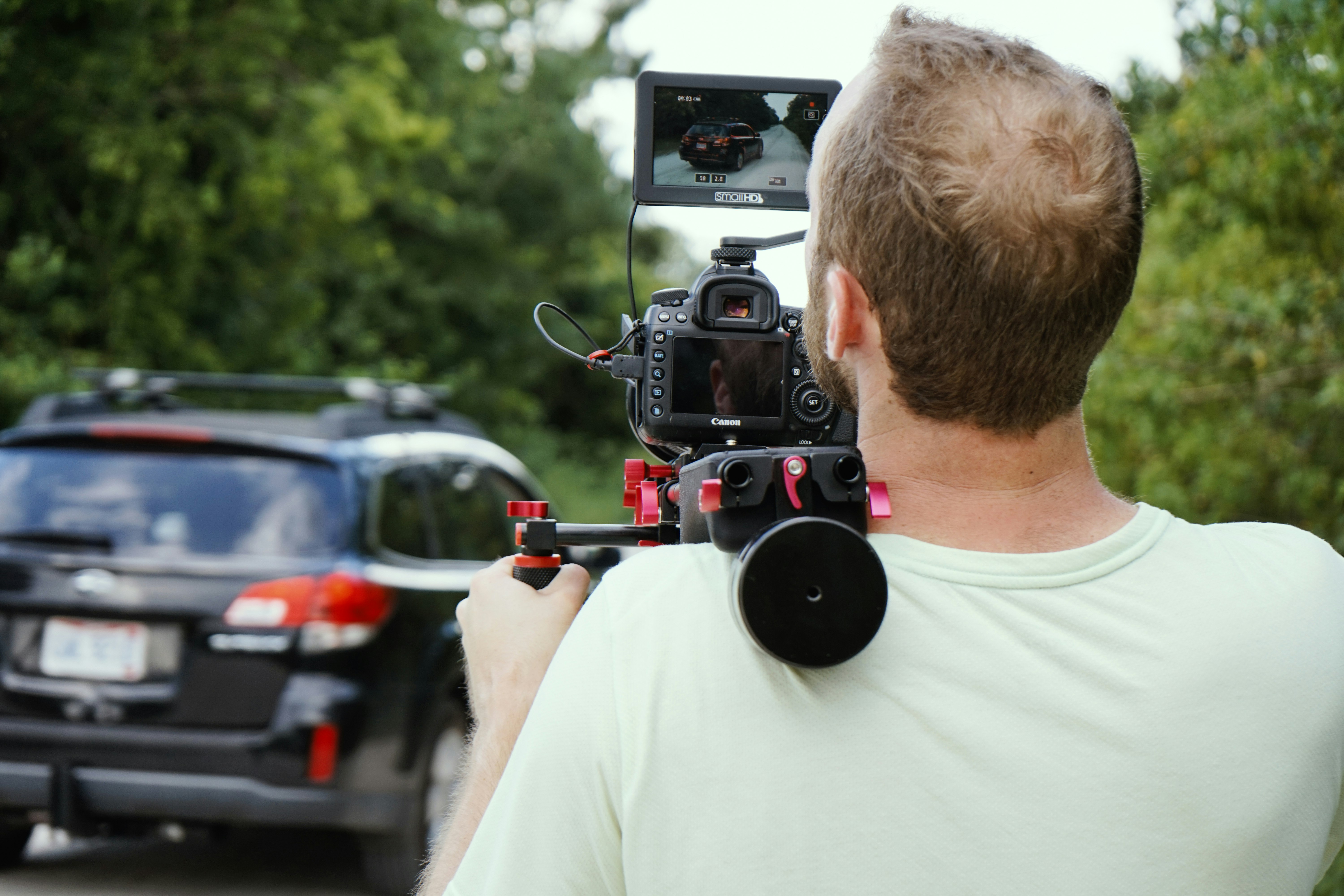 man holding professional camera