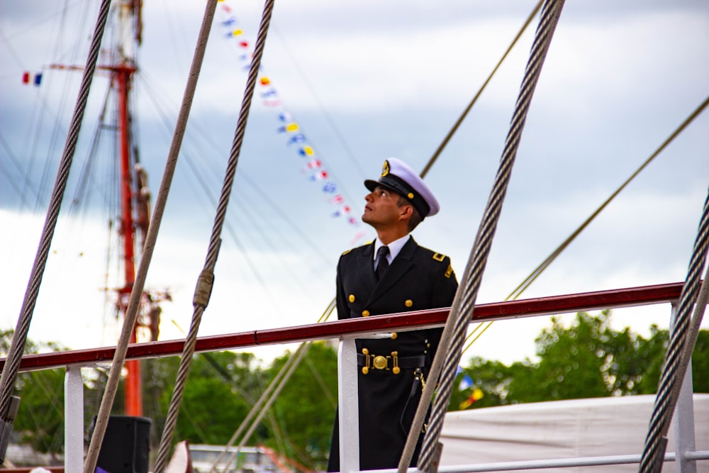 man standing on boat