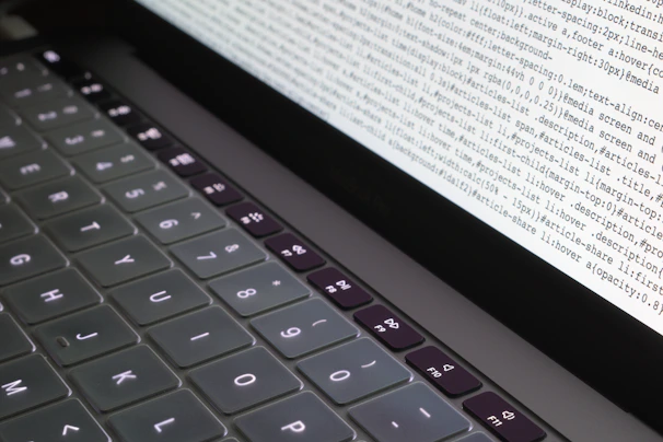 Close-up of hands typing commands during a penetration test on a laptop.