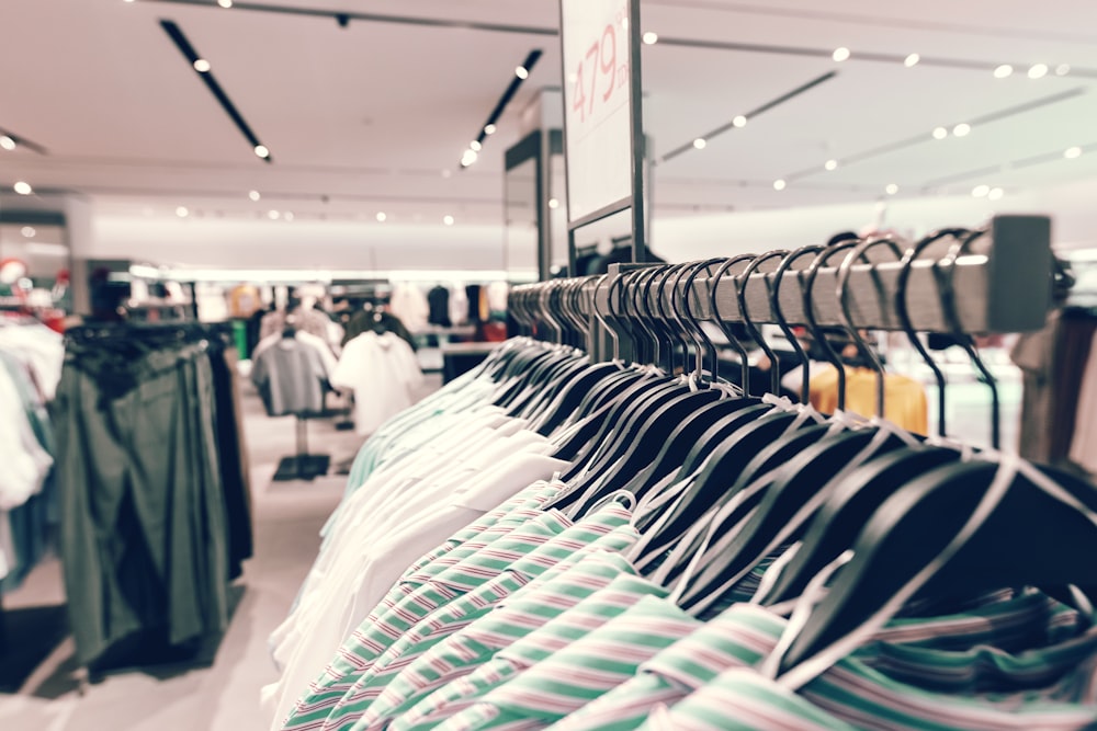 a rack of shirts in a clothing store