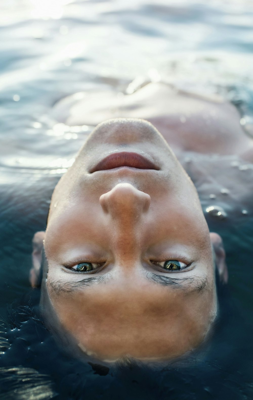 man on floating on water