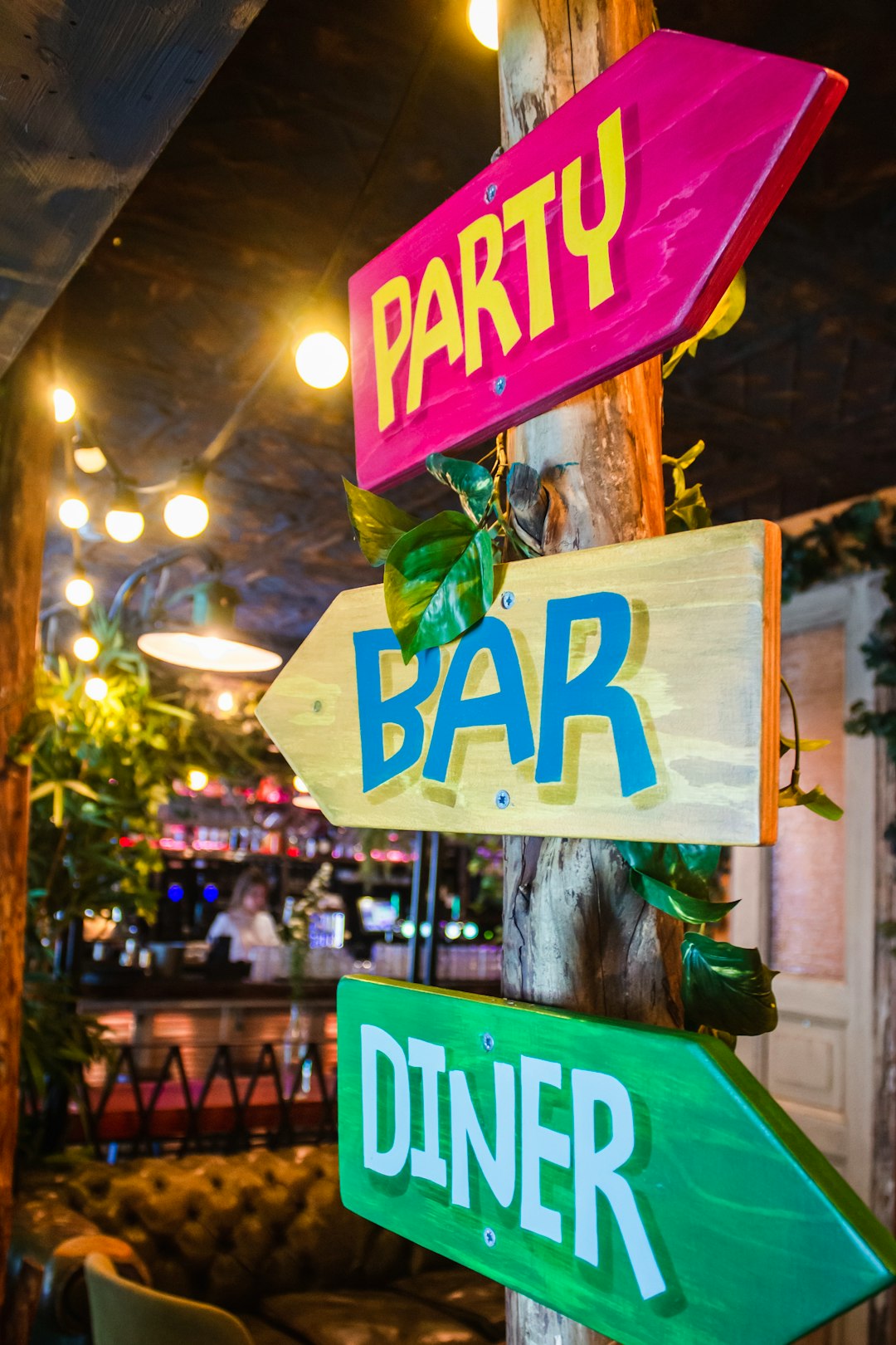 shallow focus photo of party bar diner signage