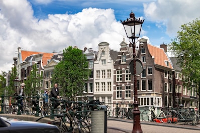 a group of bicycles parked on the side of a street