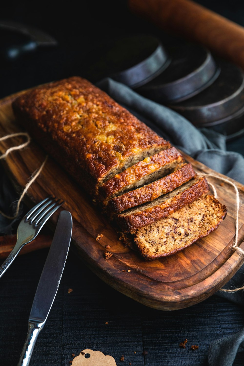 banana cake on brown wooden dish