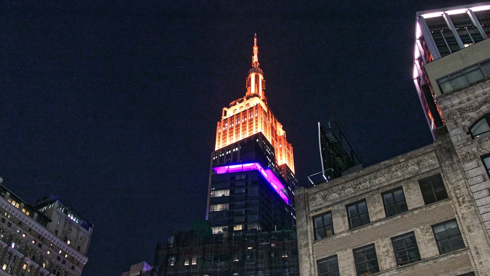 lighted tower building at night