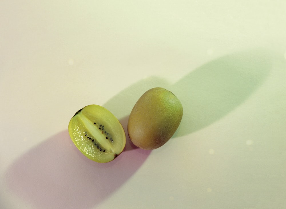 sliced kiwi fruit on white background