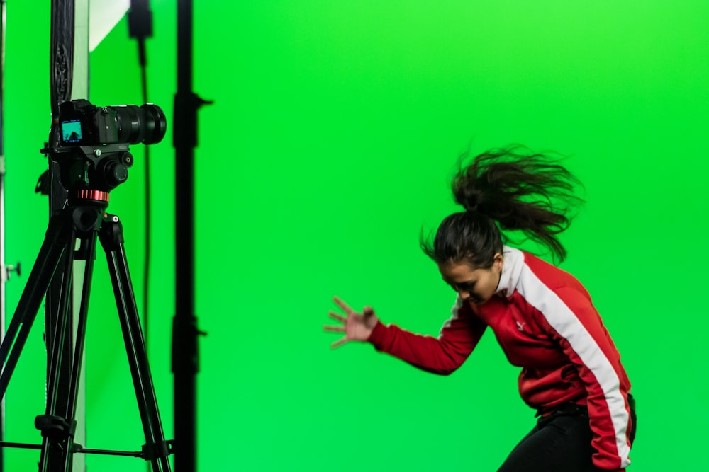 woman wearing red and white track suit