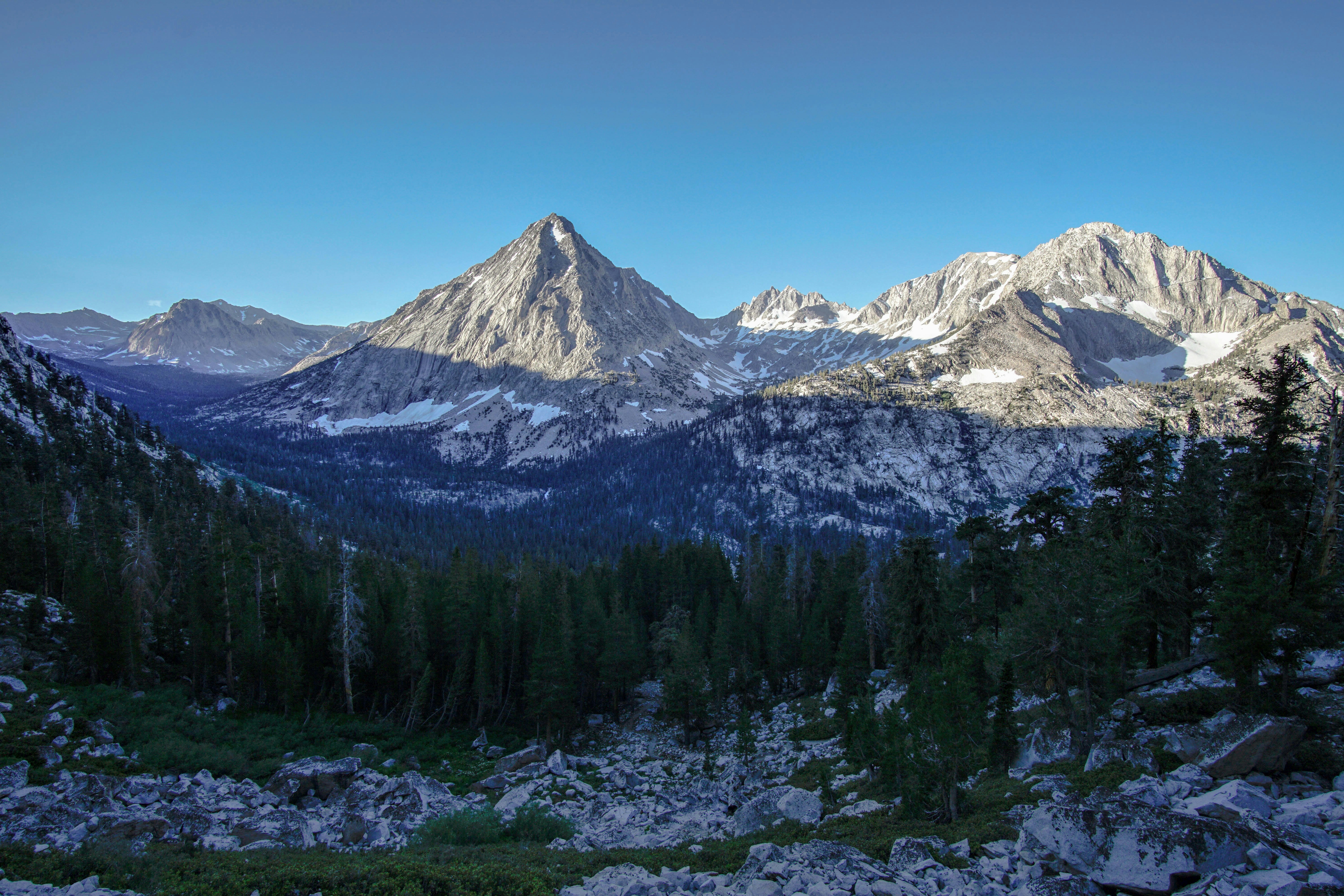 snow-covered mountain under blue sky