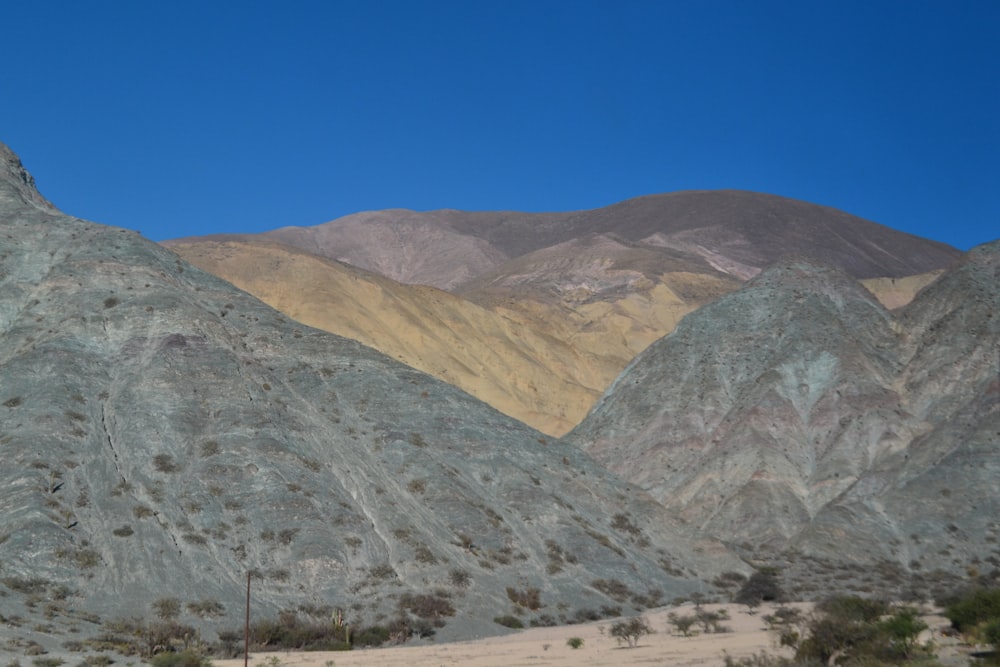 gray mountains under blue sky