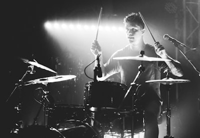 man playing drums vanguard google meet background