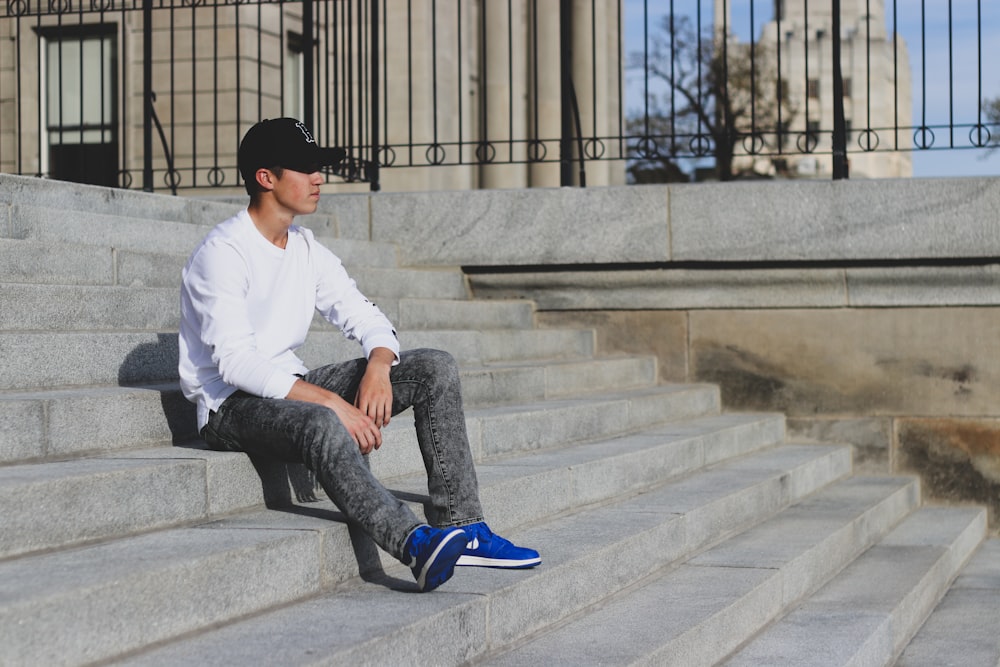 man sitting on stair