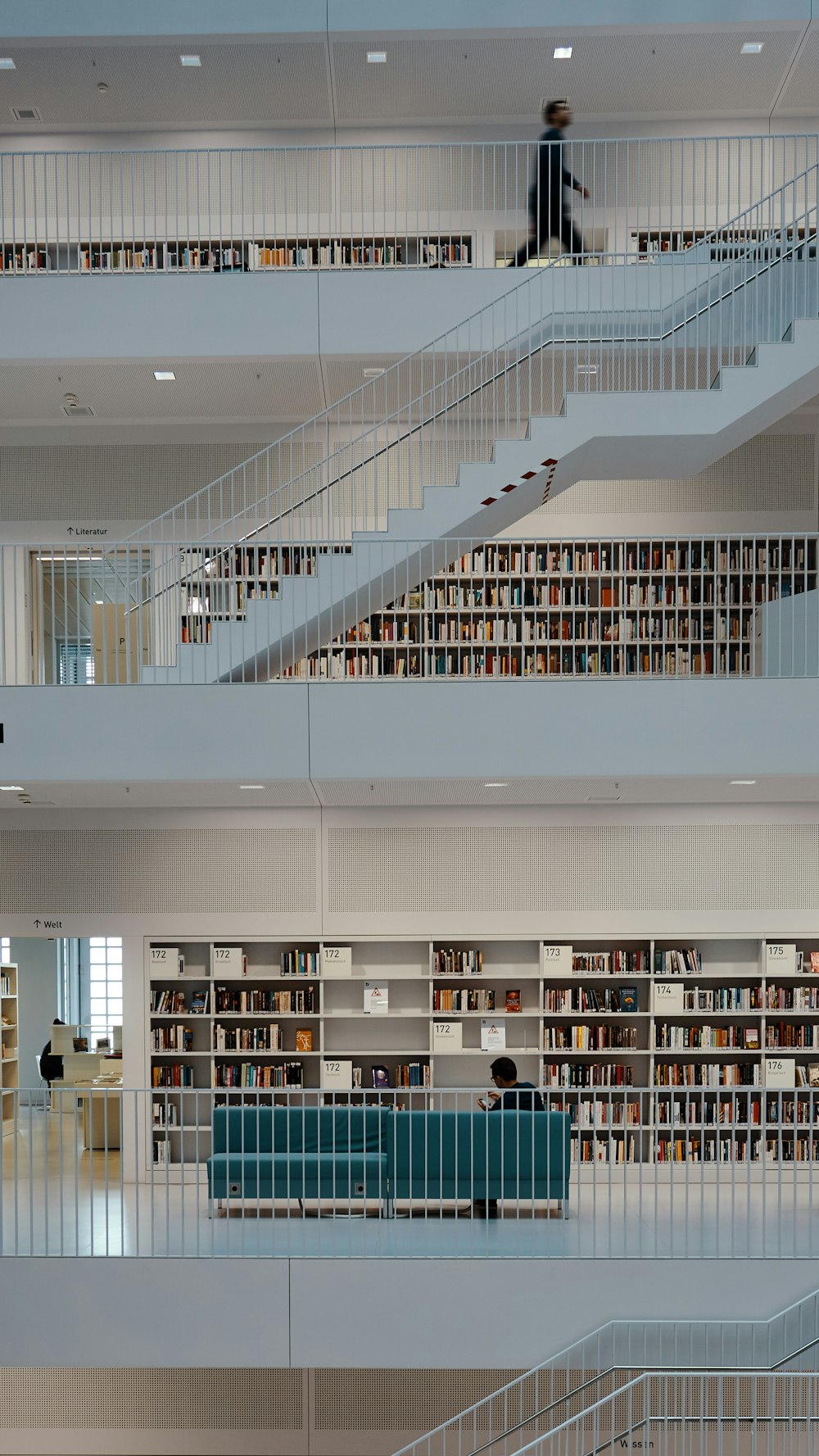 man walking on library