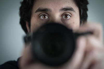 Close-up of a shooter focusing before taking a shot.