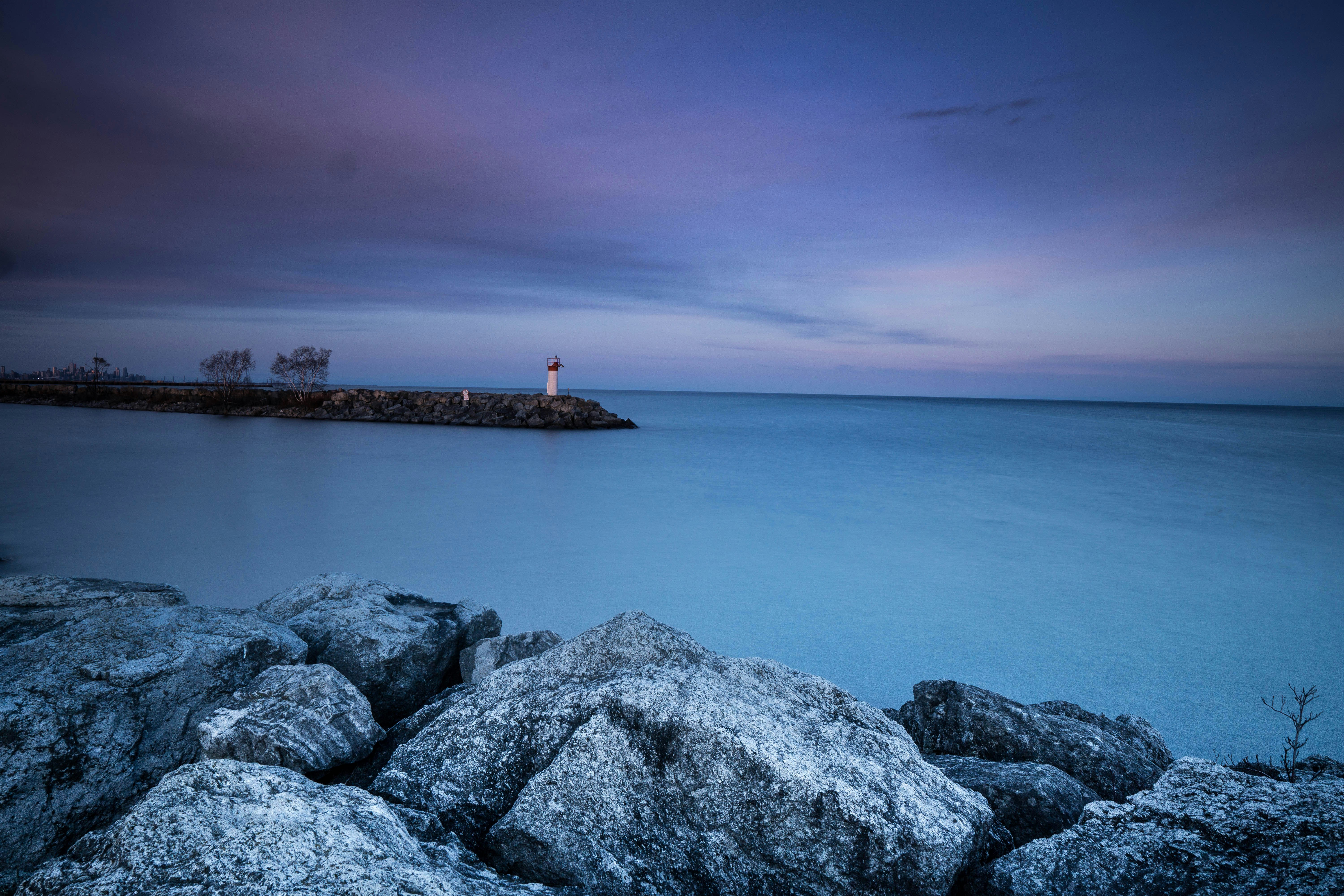 white and red lighthouse scenery