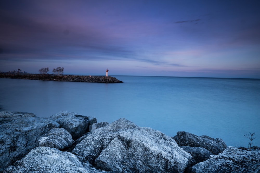 white and red lighthouse scenery