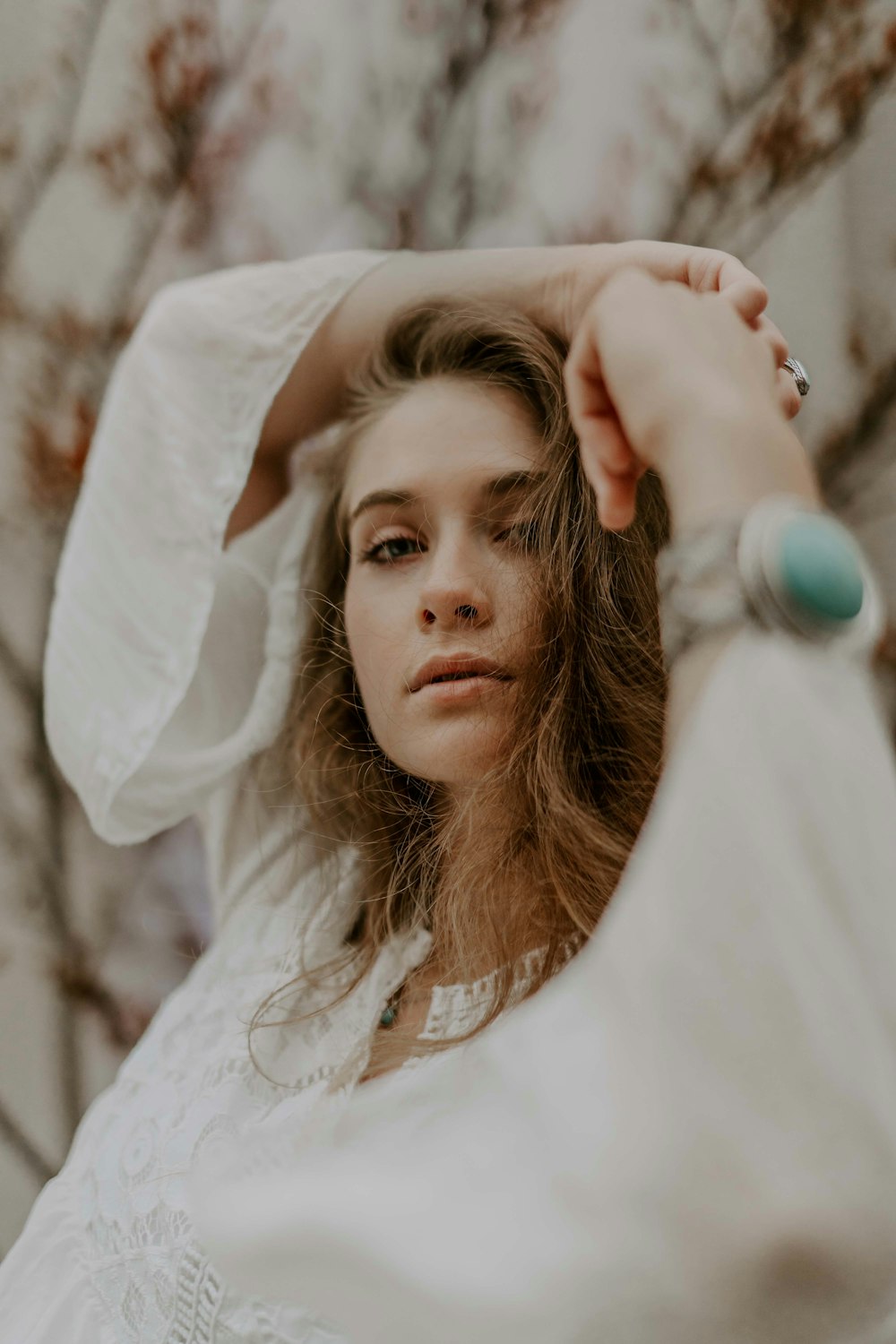 woman in white long sleeve top