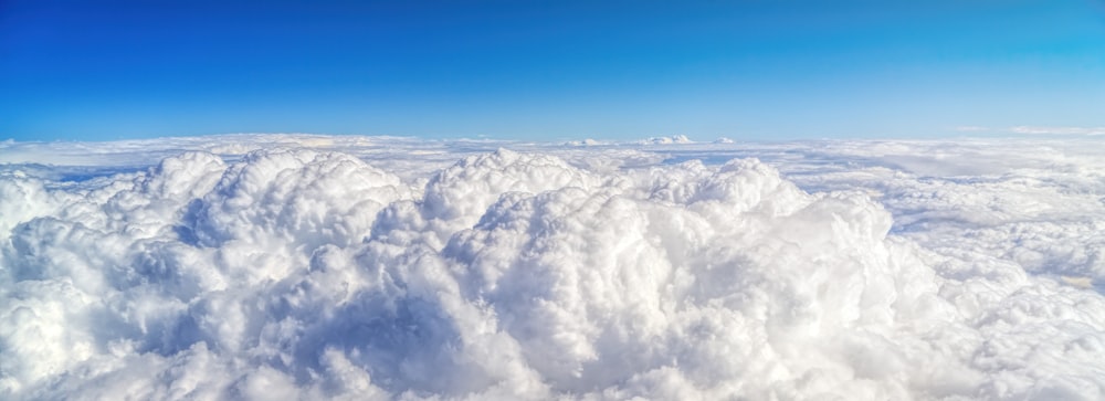 white nimbus clouds during daytime