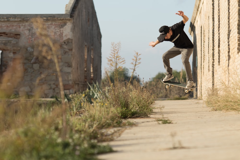 man doing stunt on skateboard