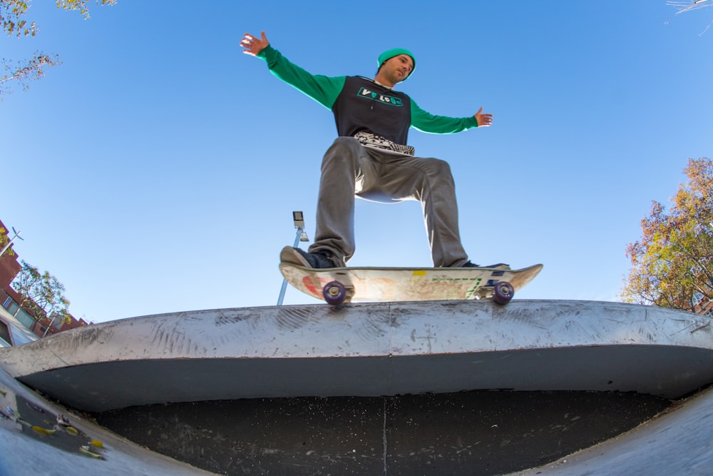 man skateboarding during daytime