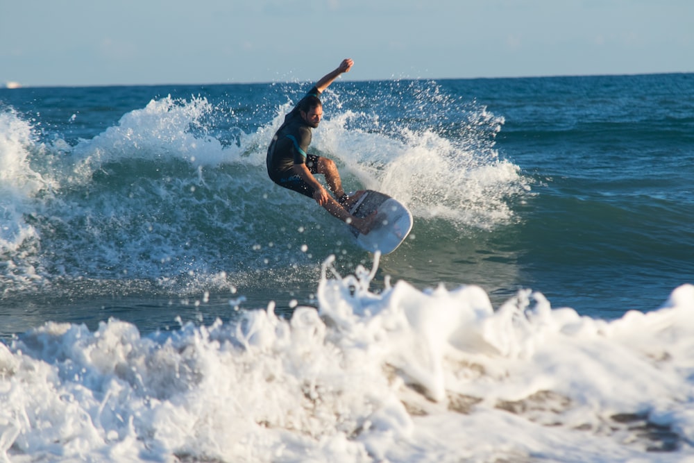 man surfing during daytime