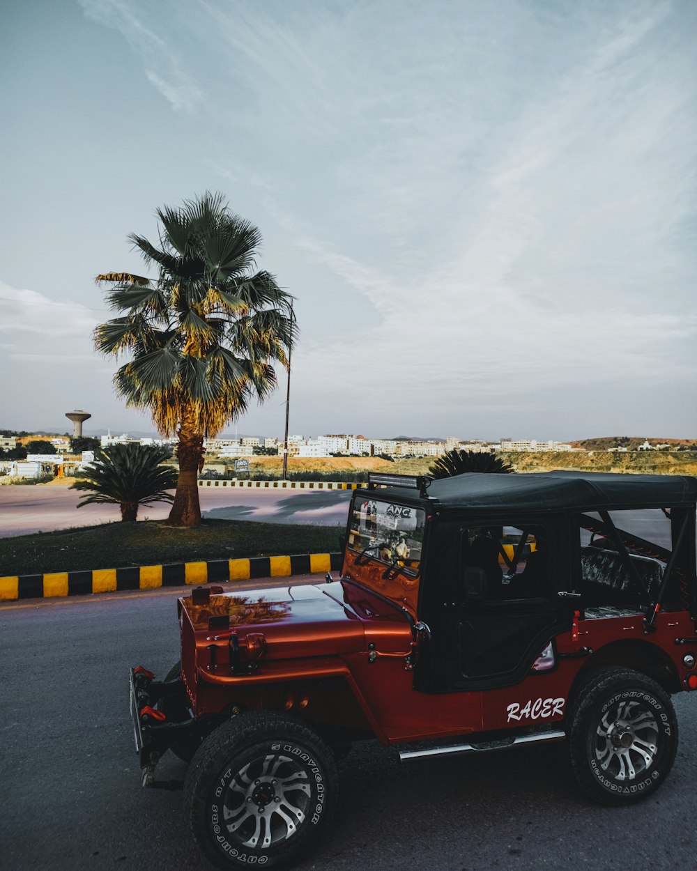 red and black Jeep Wrangler SUV