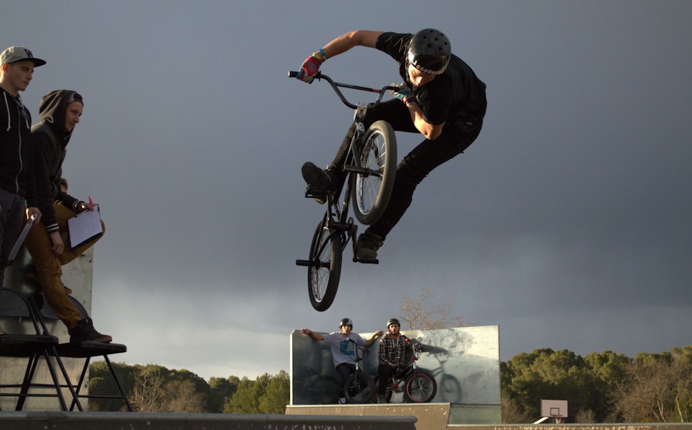 man riding on bicycle