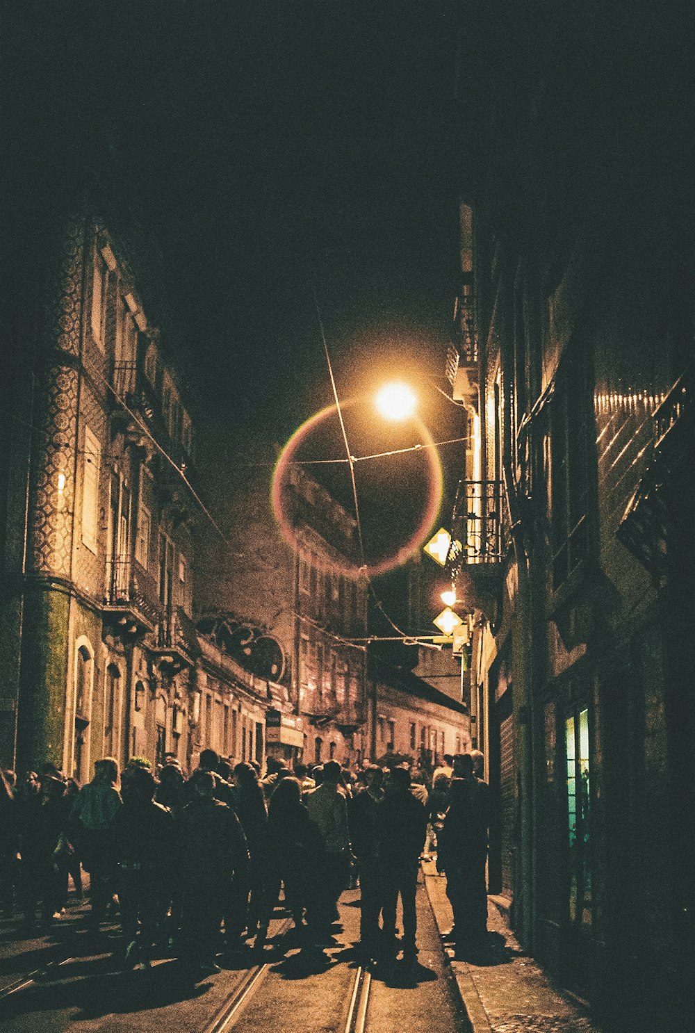 sepia photography of buildings during nighttime