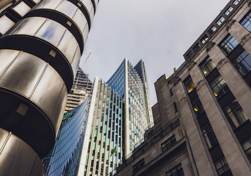 Image highlighting the contrast between restored historic buildings and sleek contemporary architecture.