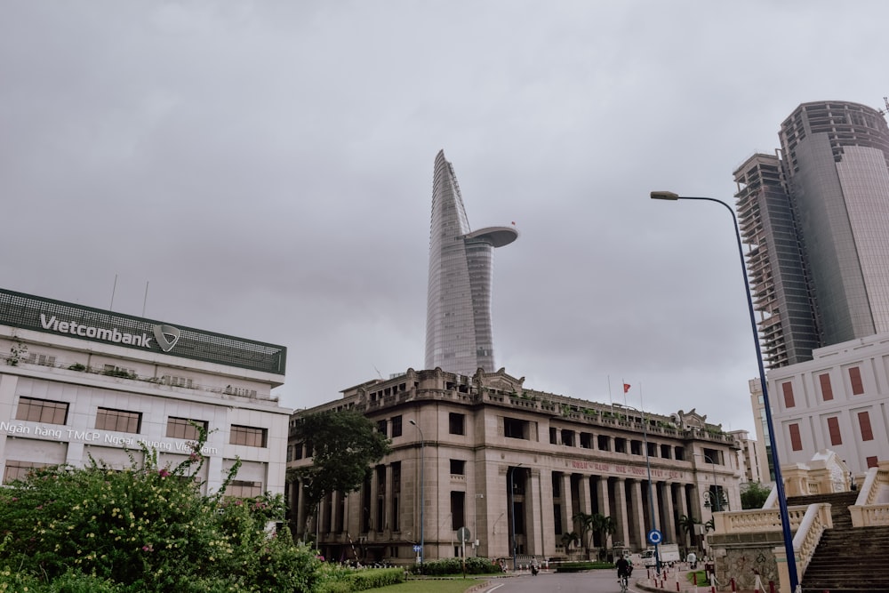 city buildings under grey cloudy sky