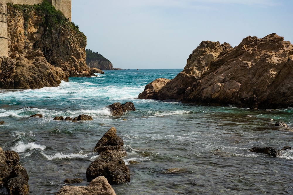 brown rocks on shore