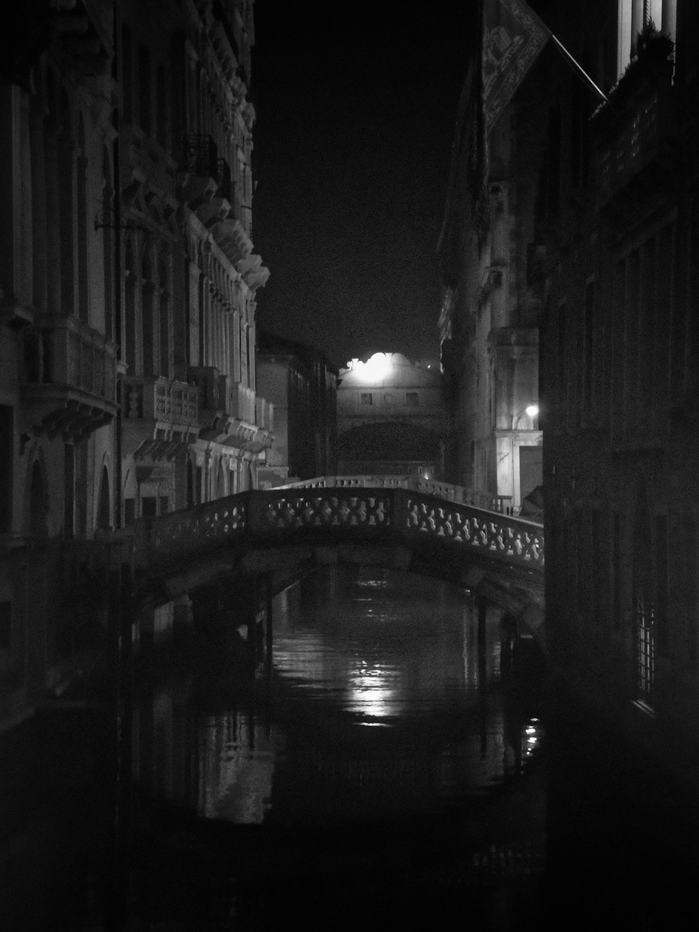 bridge and buildings during night