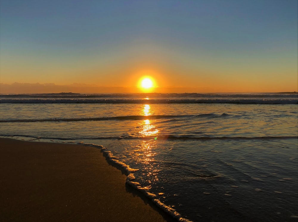 ocean waves during golden hour