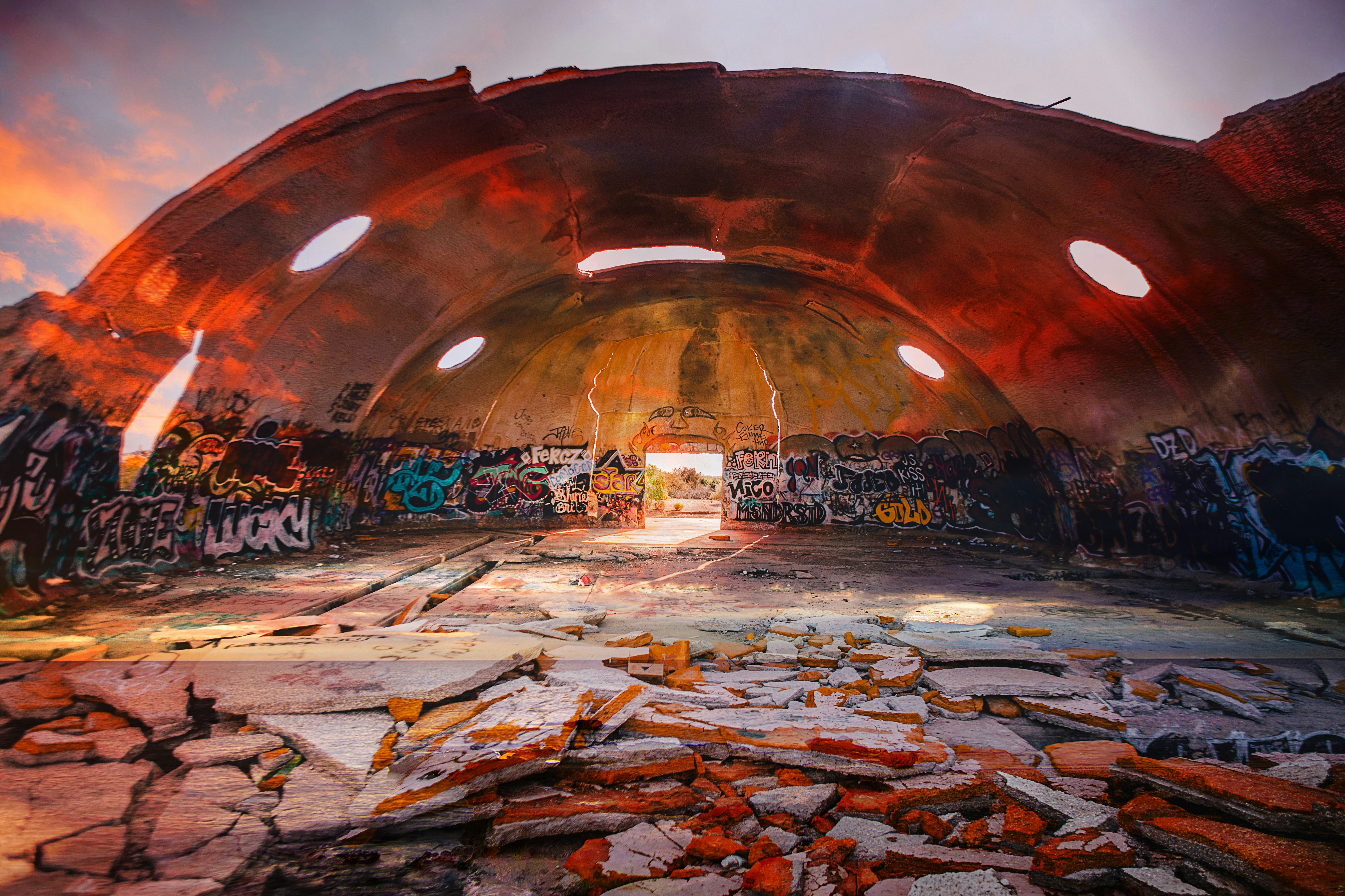 multicolored paintings on wall showing broken pathway