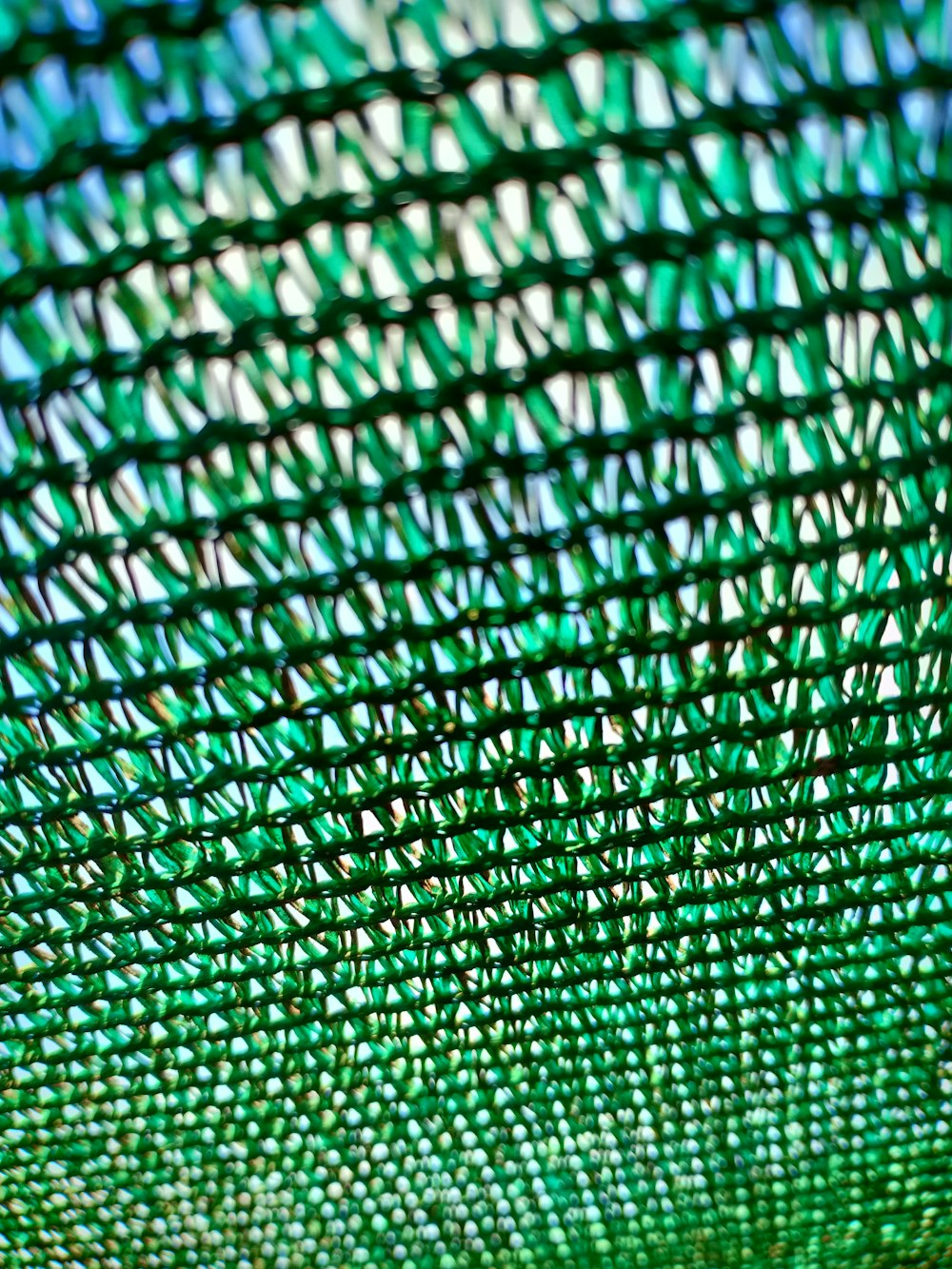 a close up view of a green net