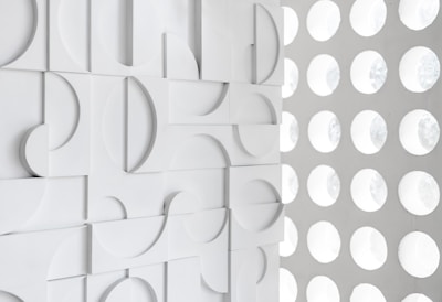 A sleek geometric design printed on a business office wall.