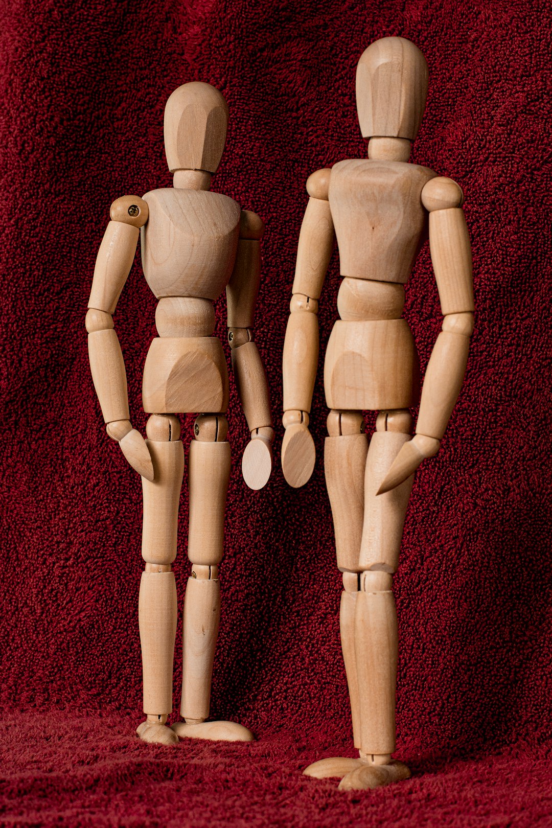 two wooden marionettes