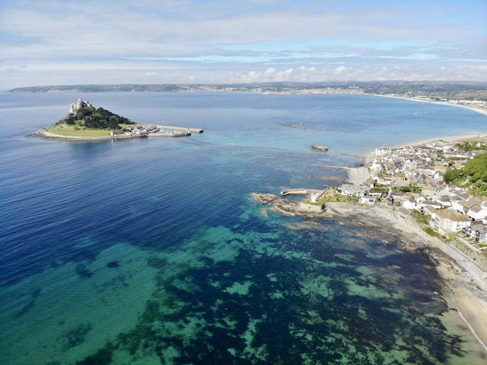 aerial photography of sea under clear blue sky