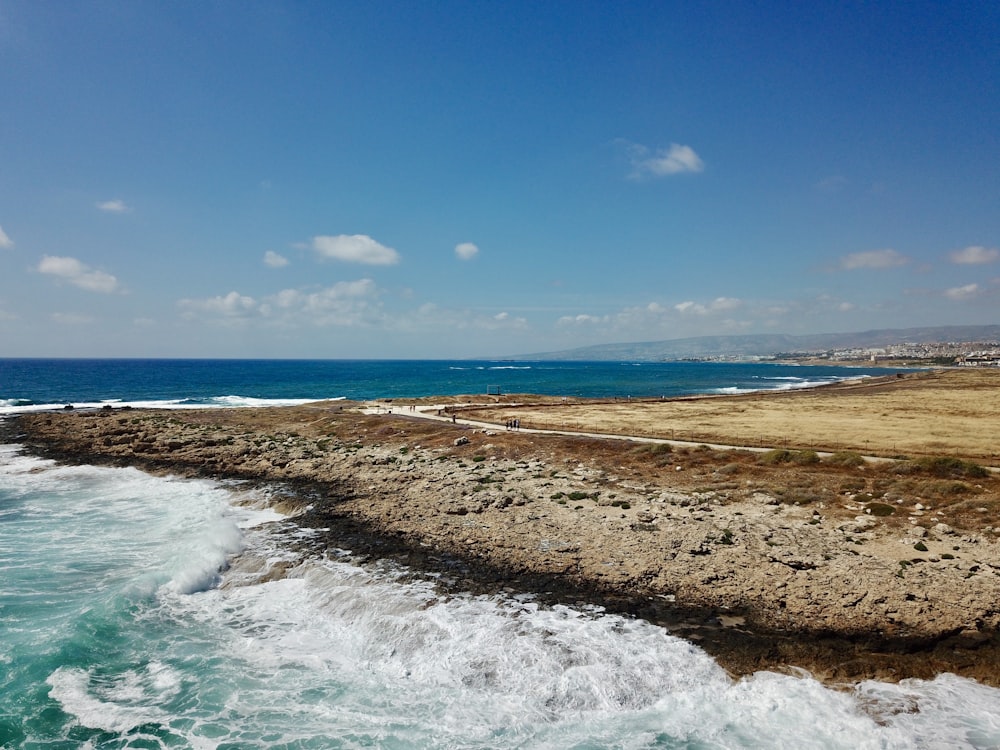 beach line under blue sky