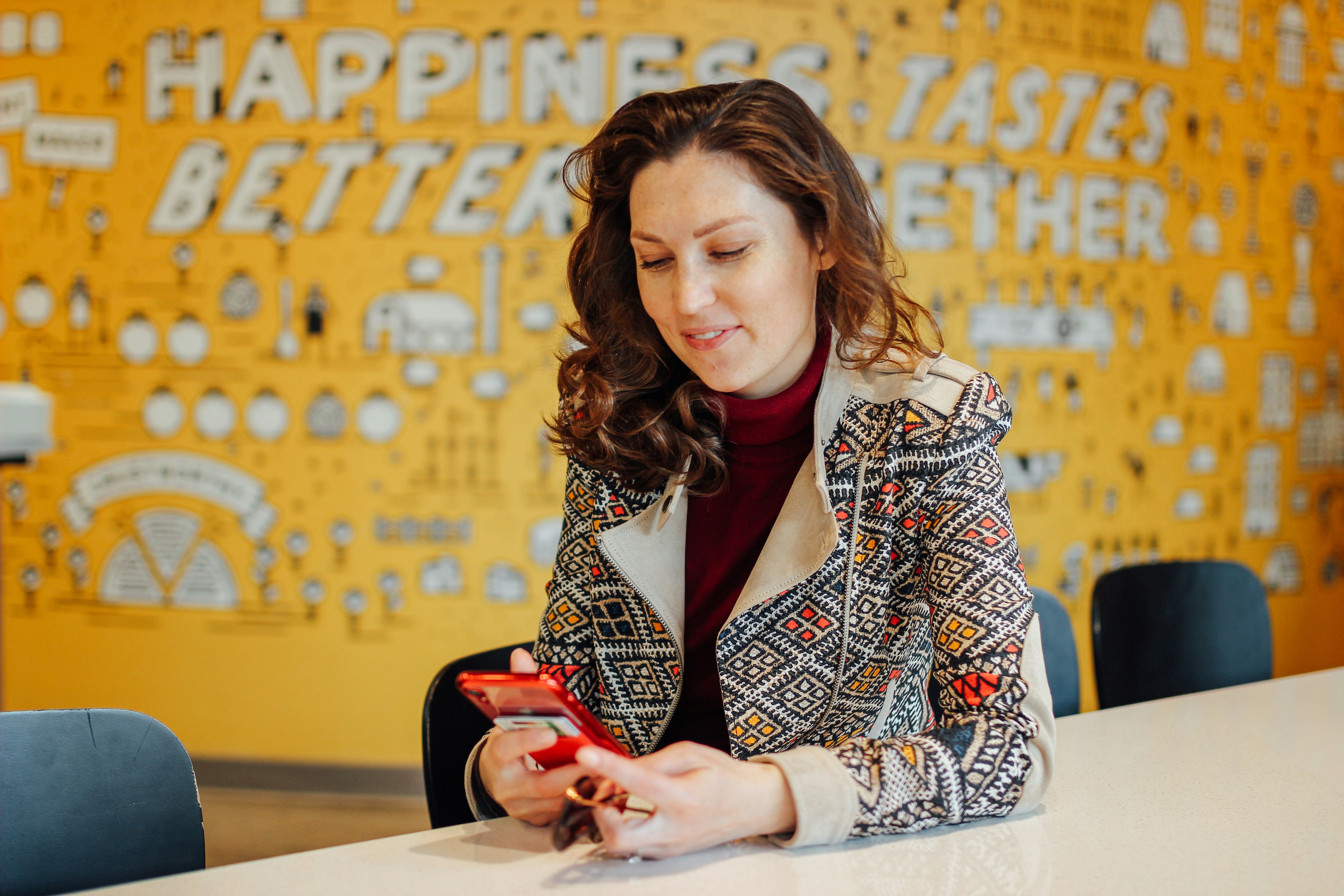 woman sitting beside table