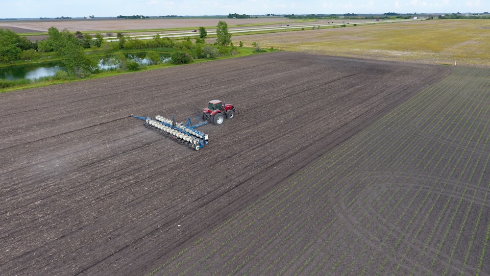 bird's eye view of a farming equipment and a field