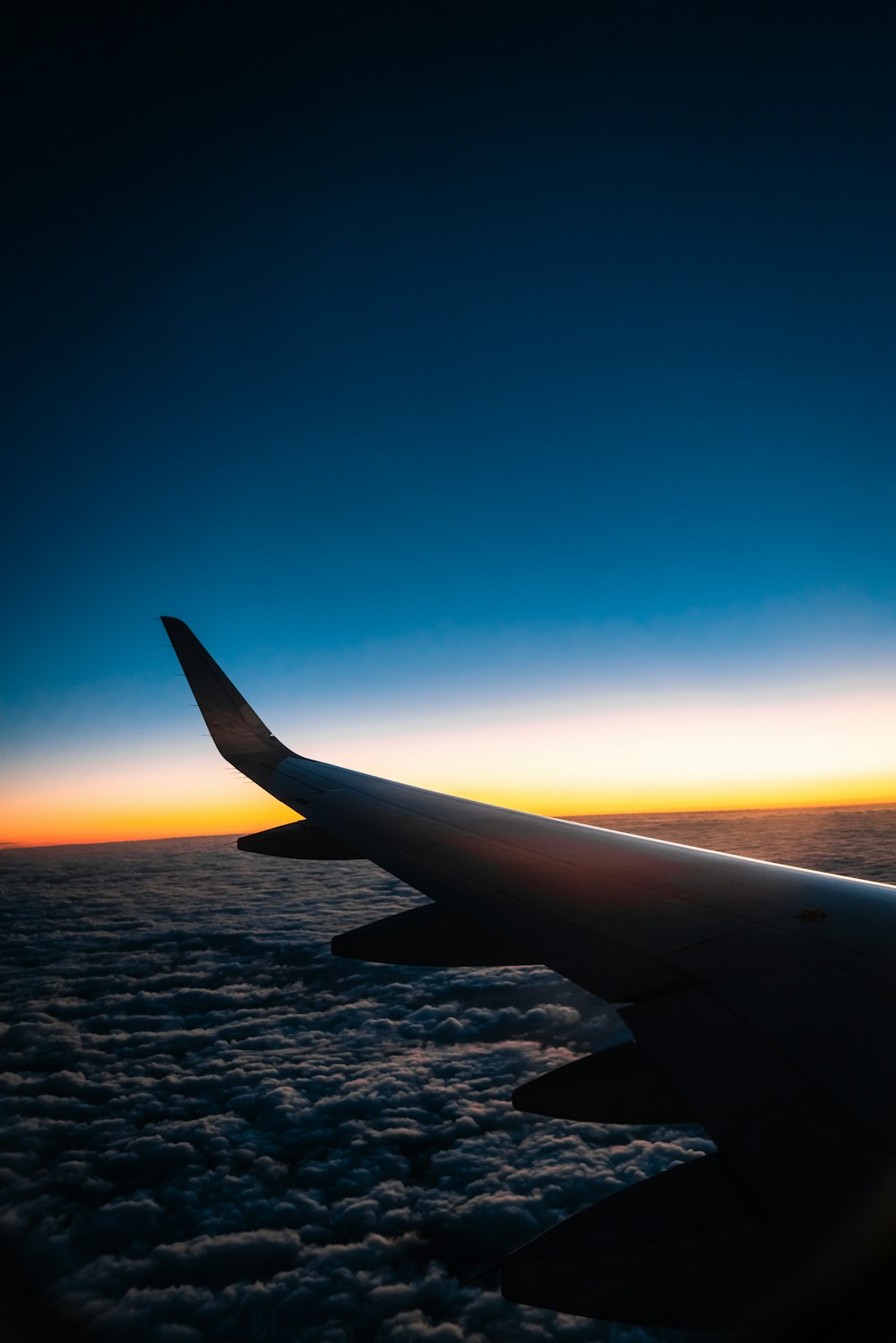 grey airliner during flight