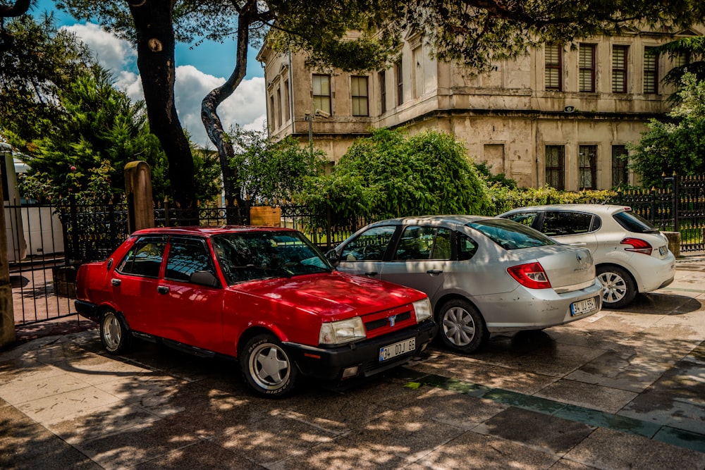 three vehicles parking at the gate