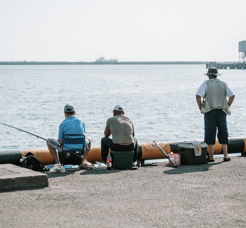 people fishing across horizon during daytime