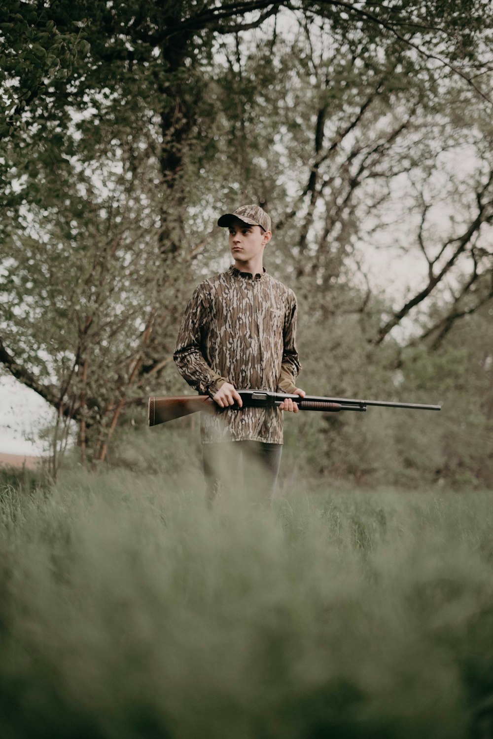 man holding rifle