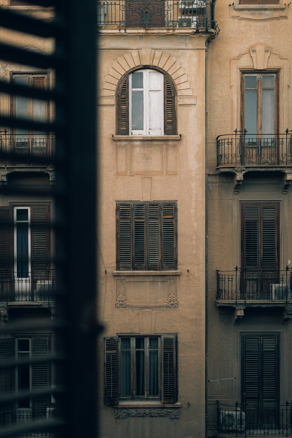 beige building with arch window